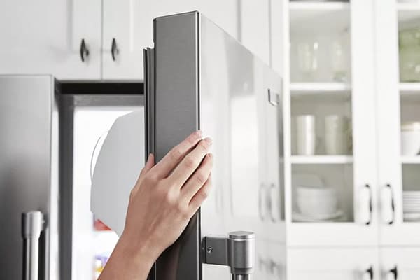 https://www.sloanappliance.com/wp-content/uploads/2023/07/Maytag-refrigerator-door-not-closing.jpg